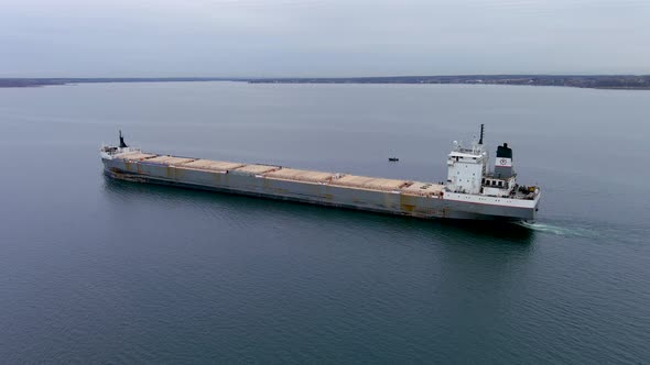 4K aerial footage of a cargo ship navigating the St Lawrence Seaway, Canada.