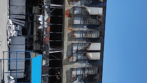 Vertical Video of a Destroyed Building of a Shopping Center in Bucha Ukraine alt