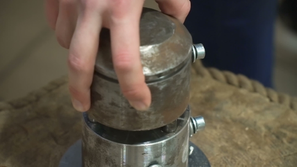 Blacksmith Hammer Blow Makes Souvenir Coins.