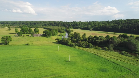 Flight Over River in Meadows