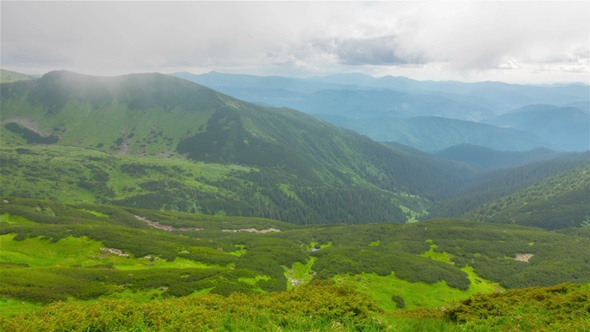 Mountain Peak in Clouds alt