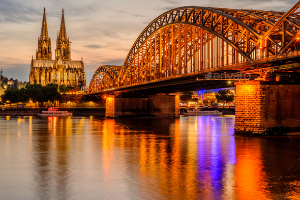 Cologne Cathedral and Hohenzollern Bridge at sunset, Germany