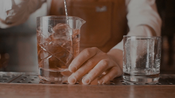 The Bartender Makes a Cocktail