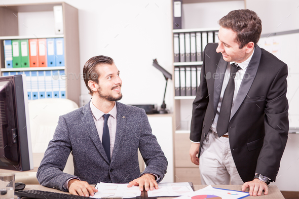 Professional Businessmans in formal suits working in office