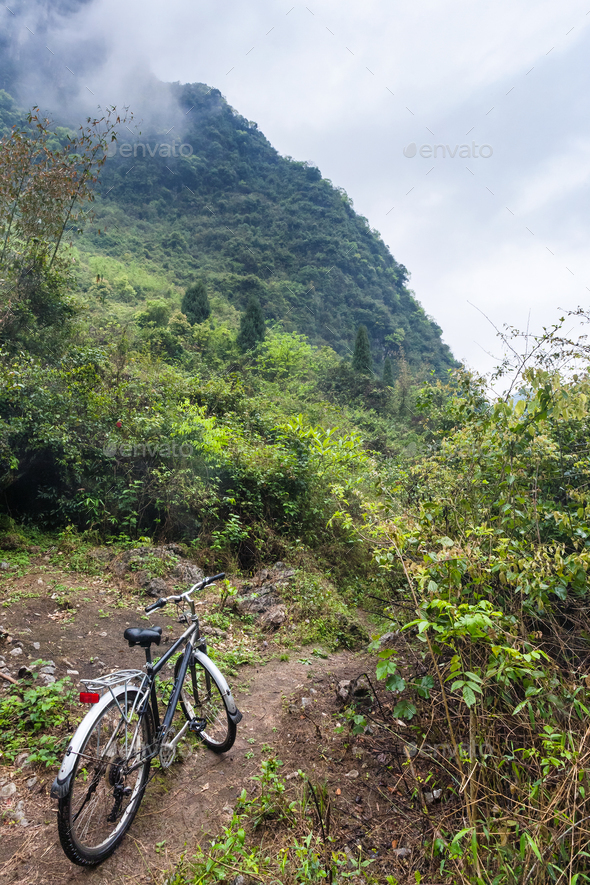 bicycle on between mountain peaks in Yangshuo