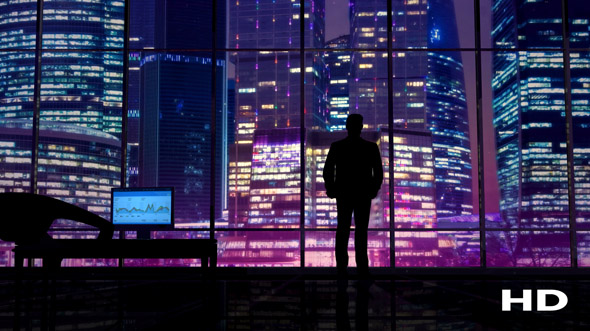 Businessman In An Office On A Background Of Night Skyscrapers, Motion ...