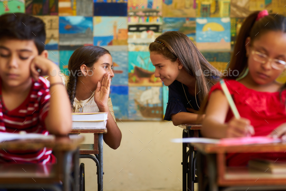 Girls Cheating During Admission Test In Class At School - Stock Photo - Images