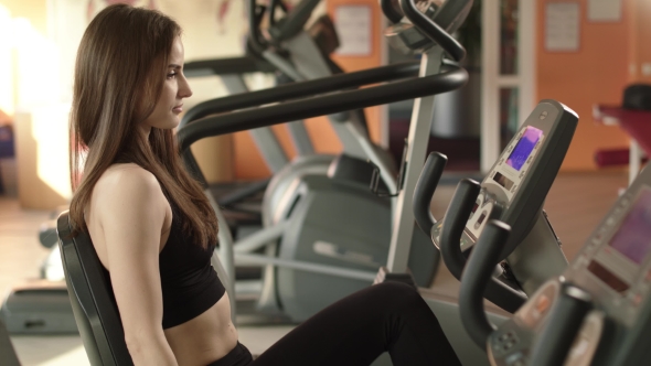 Athletic Girl Is At A Gym