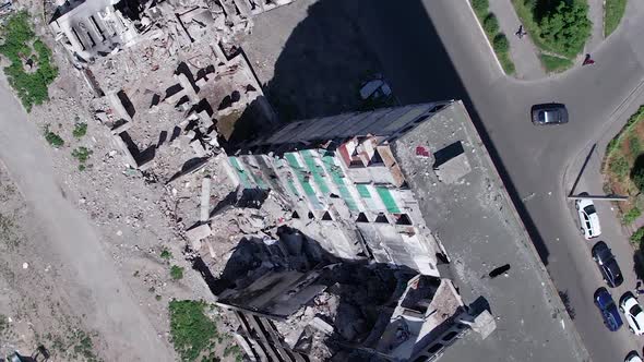 Vertical Video of the Consequences of the War in Ukraine  a Destroyed Building alt