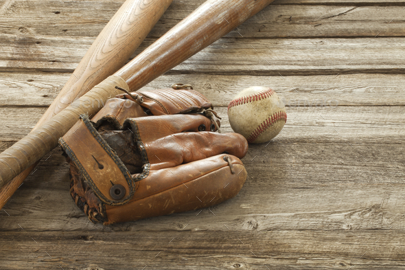 Old Baseball Mitt Ball and Bats on Wood - Stock Photo - Images