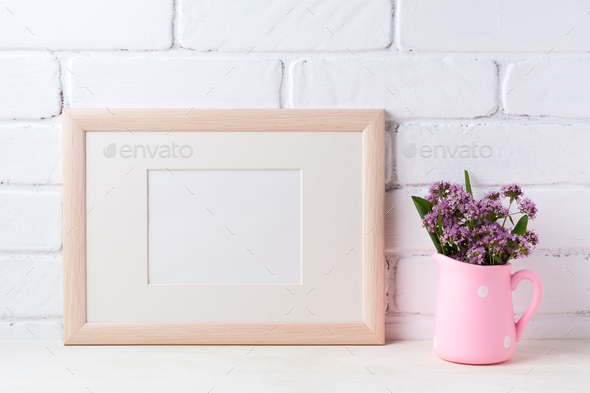 Wooden landscape frame mockup with purple flowers in pink rustic