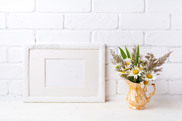 White landscape frame mockup with chamomile and grass in golden