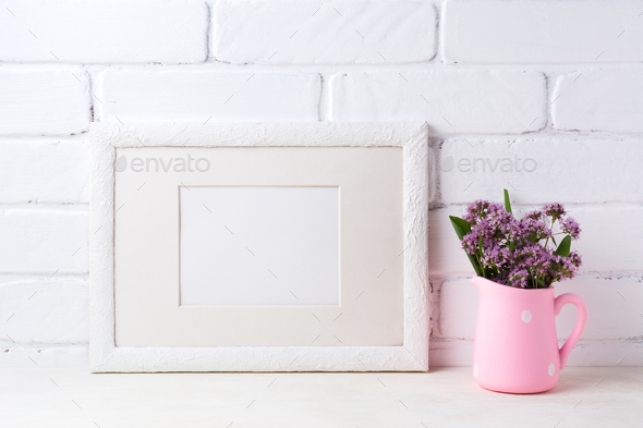 White landscape frame mockup with purple flowers in pink rustic