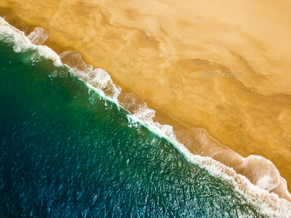 Top view of a deserted beach. The Portuguese coast of the Atlant
