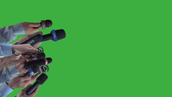 Many live reporter hands with mic,broadcasting for tv,radio and internet alt