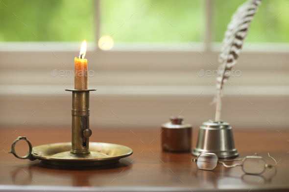 Desktop and Window with Candle and Old Quill and Inkwell