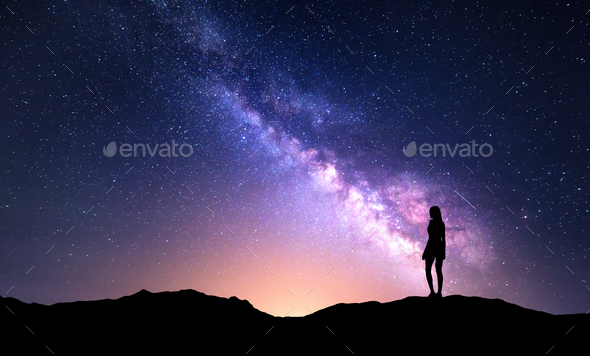 Beautiful Milky Way with standing woman. Colorful night sky - Stock Photo - Images