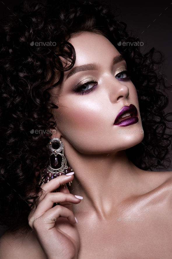Glamour lady, Beautiful Girl on gray background. Portrait. Wavy Hair, perfect make up. Closed eyes. - Stock Photo - Images