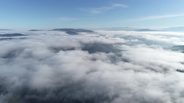 Clouds and Blue Sky Seen From Plane alt