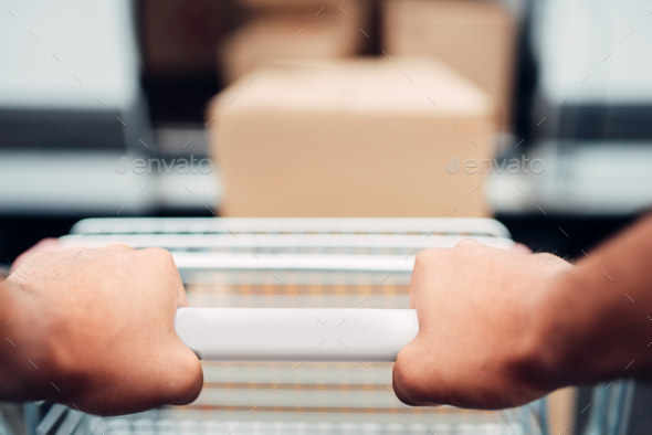 Male hands with cargo trolley, cargo delivery - Stock Photo - Images