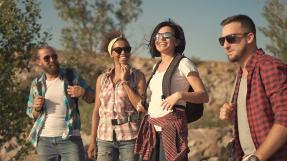 Group of Travelers Talking on Nature alt