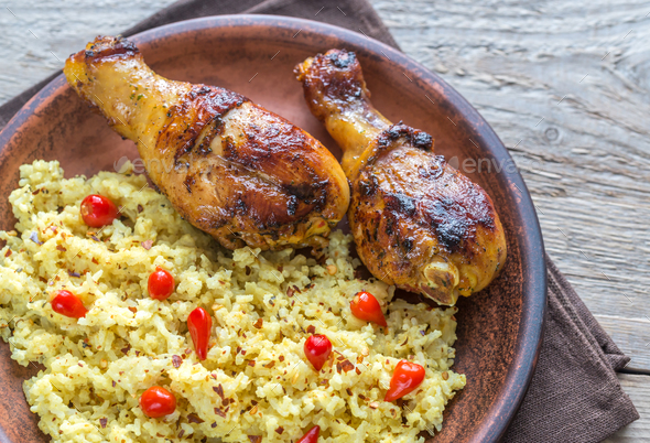 Spicy chicken drumsticks with rice curry