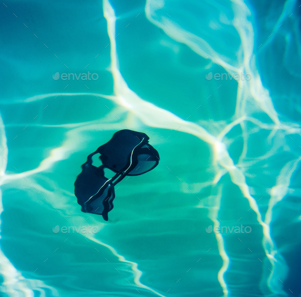 Swimming Pool Sunglasses Stock Photo by mrdoomits | PhotoDune