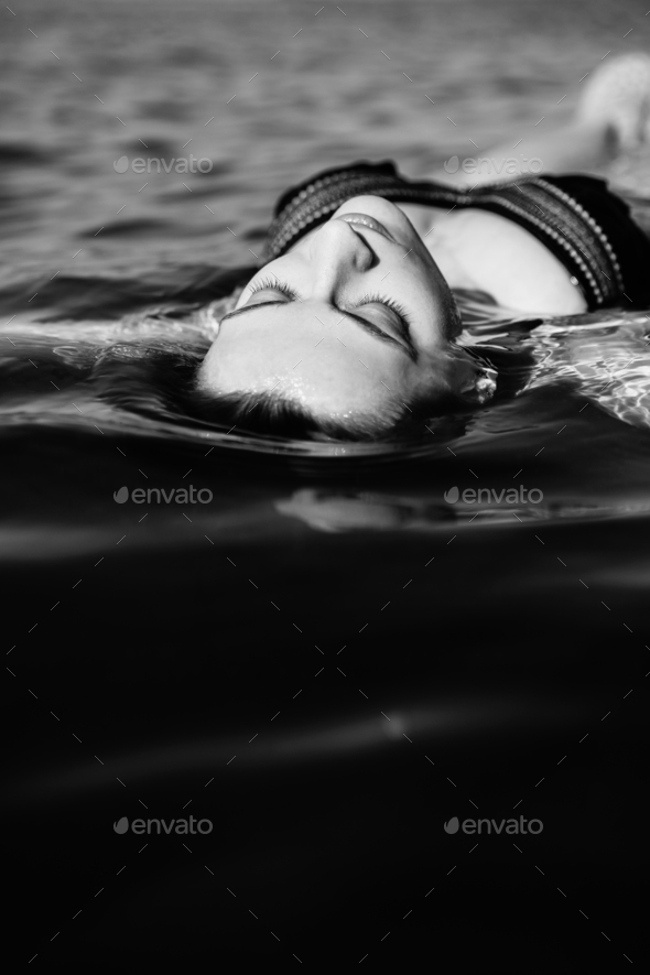 Woman floating on water