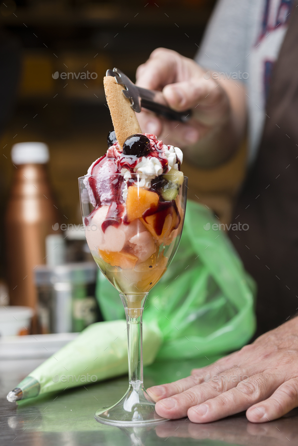 Italian ice cream artisanal preparation Stock Photo by alessandrozocc