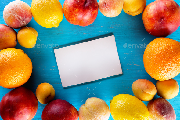 Fresh fruits on a blue wooden table - Stock Photo - Images