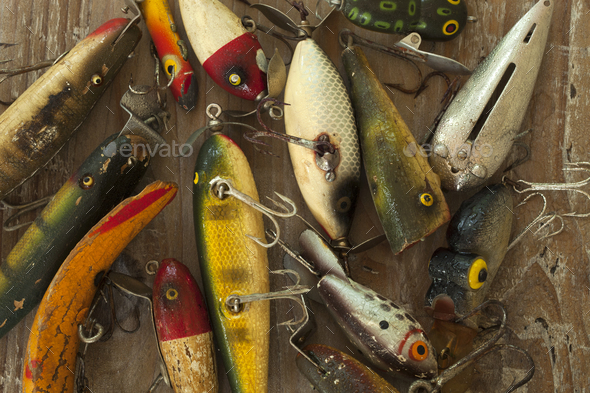 Antique Fishing Lures with Water Droplets in a Messy Pile Stock