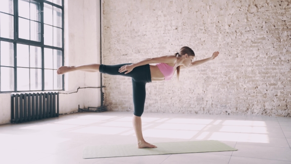 Beautiful Yoga Girl Doing Asanas in Studio, Stock Footage | VideoHive