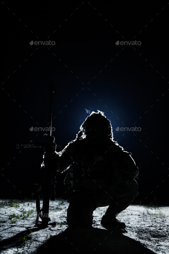 Lone killer in the moonlight - Stock Photo - Images
