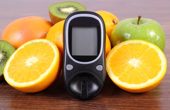 Glucometer and fresh fruits, diabetes, healthy lifestyles and nutrition