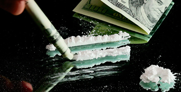 Cocaine Snorted Through Rolled 100 Dollar Banknote