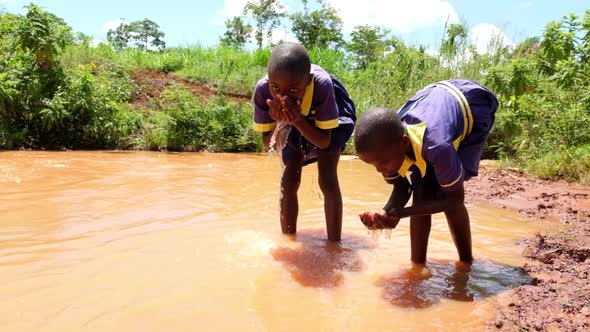 Children Drinking Muddy Water, Stock Footage | VideoHive