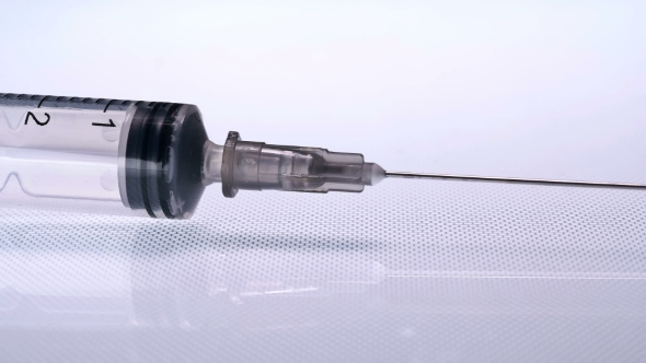 Syringe on White Background, Stock Footage | VideoHive