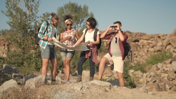 Travelers Watching Map While Traveling alt
