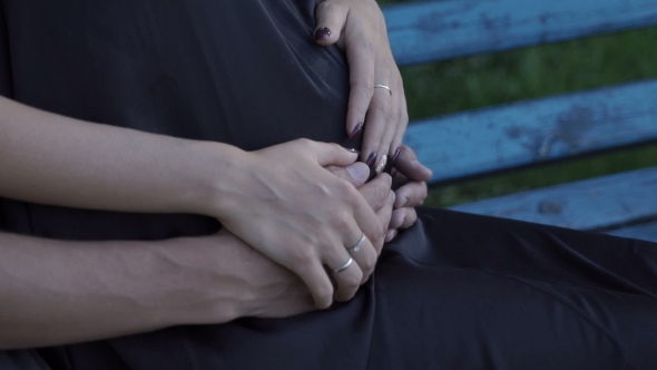 Hands on Pregnant Belly