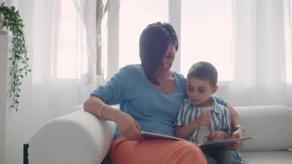 Mother and Son Read Books alt