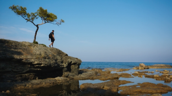 Traveler Photographer Shoots Beautiful Sunset on the Mediterranean Coast