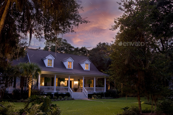 classic home at sunset - Stock Photo - Images