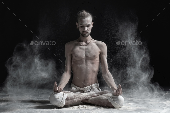 Padmasana with palms in mudra - Stock Photo - Images