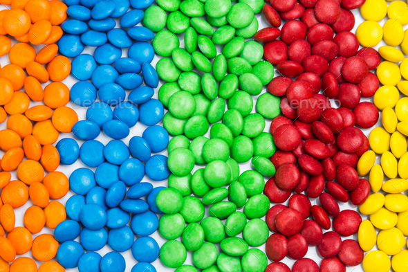 Pile of colorful chocolate candy by color in rows columns Stock Photo ...