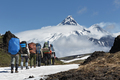 Group of Hikers Goes in Mountain on Background Volcanoes of Kamchatka Peninsula - PhotoDune Item for Sale
