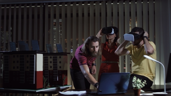 People with VR Headsets in Office alt