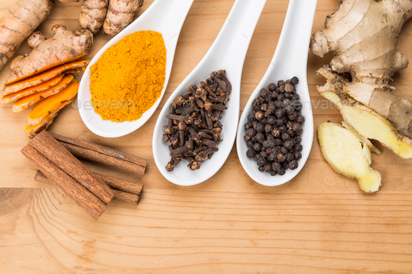 Ingredients for turmeric tea consisting ginger, cinnamon, cloves Stock  Photo by ThamKC