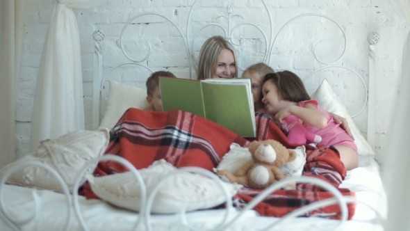 Mother and Children Reading Book alt