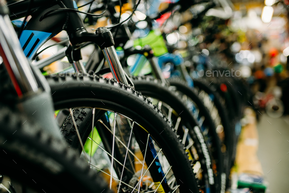 Bicycle shop, rows of new bikes, cycle sport store Stock Photo by NomadSoul1