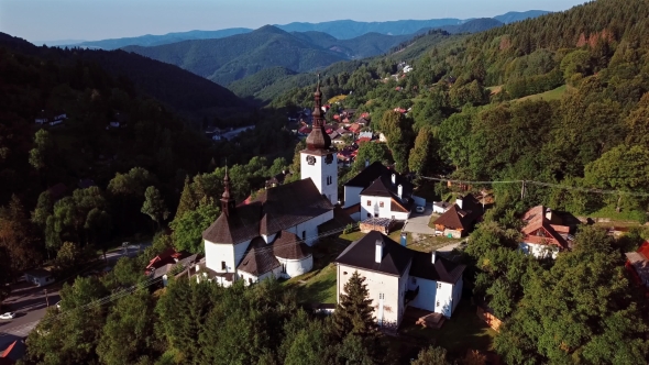 Flying Over Church in Spania Dolina, Slovakia alt